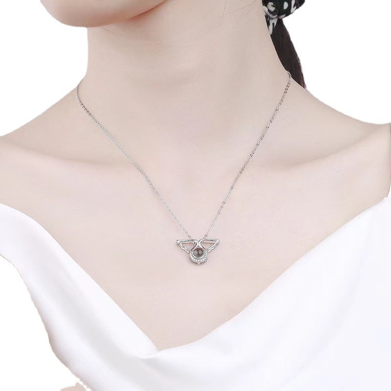 Personality niche 100 languages Love Memory Angel Wing projection pendant
