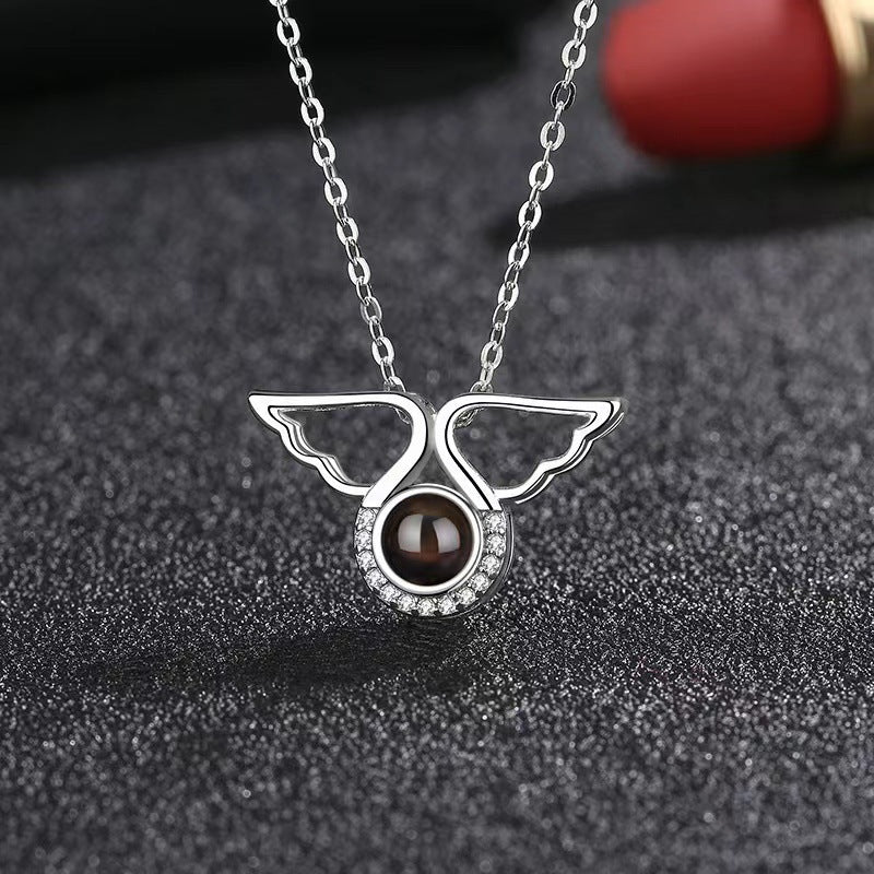 Personality niche 100 languages Love Memory Angel Wing projection pendant
