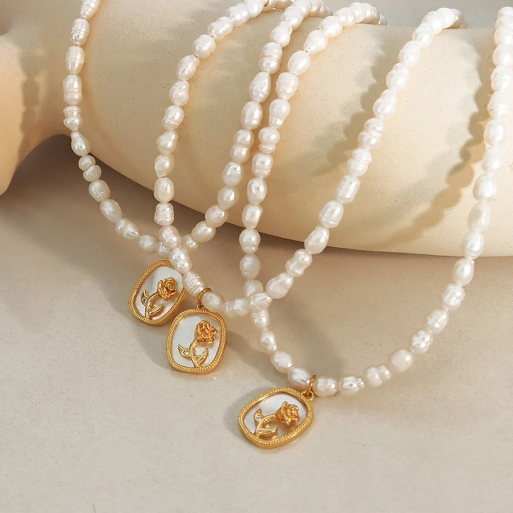 Freshwater Pearl Necklace with Zircon, Colored Shell Relief Floral Pattern Pendant