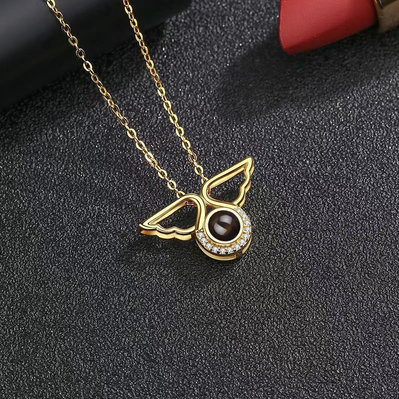 Personality niche 100 languages Love Memory Angel Wing projection pendant